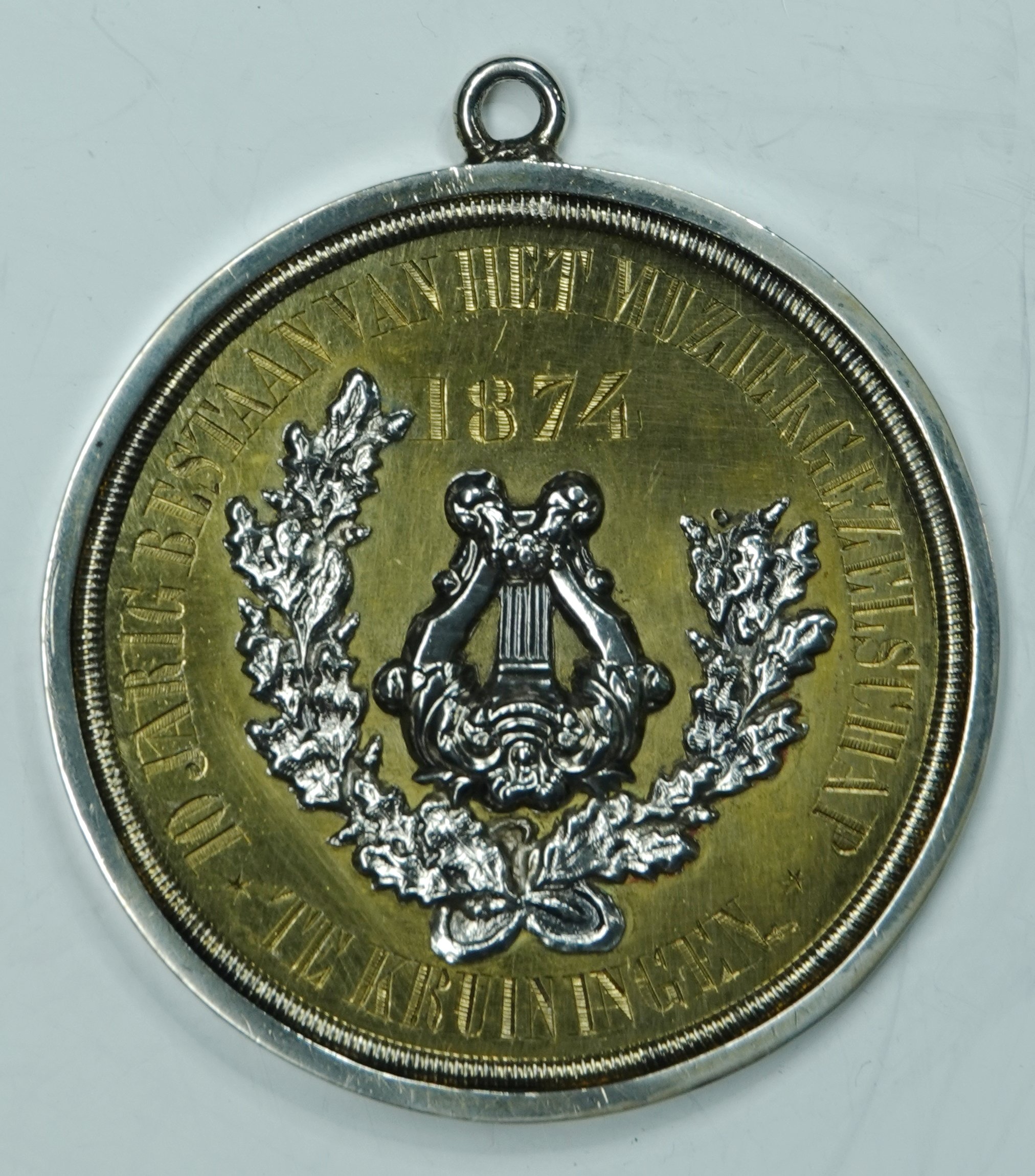 emm10jaaraangebodendoordekruiningseschutterijdedriekorenbloemkensemmmedaillesenaandenkens104.jpg